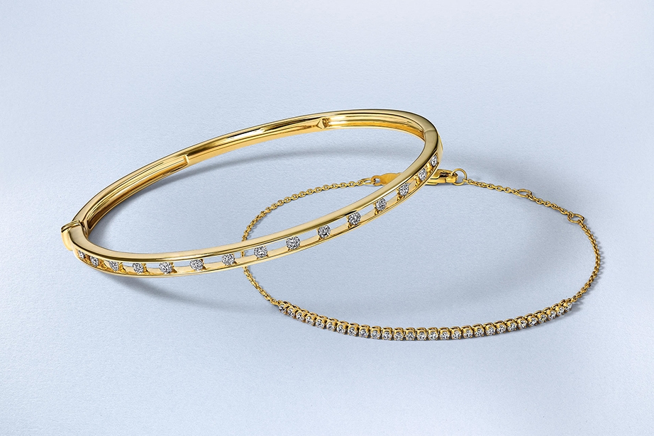Yellow gold diamond bracelets at KAY.