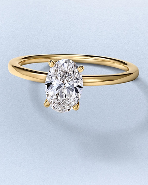 Yellow Gold Oval-Cut Solitaire Diamond Ring by KAY.