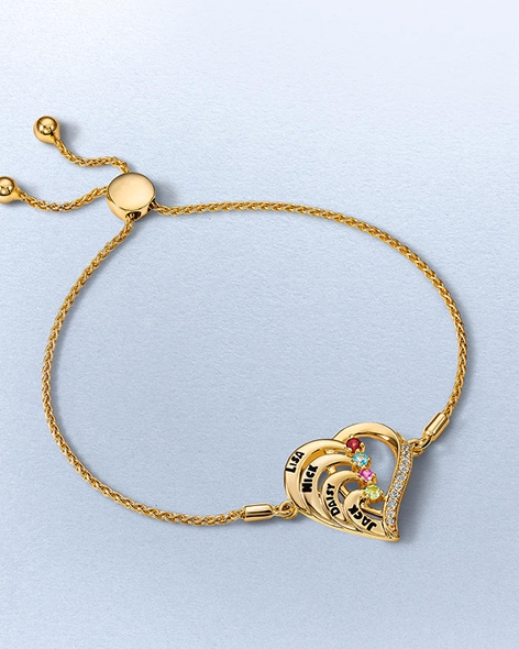 Personalized yellow gold bolo bracelet with engraving and gemstones by KAY.