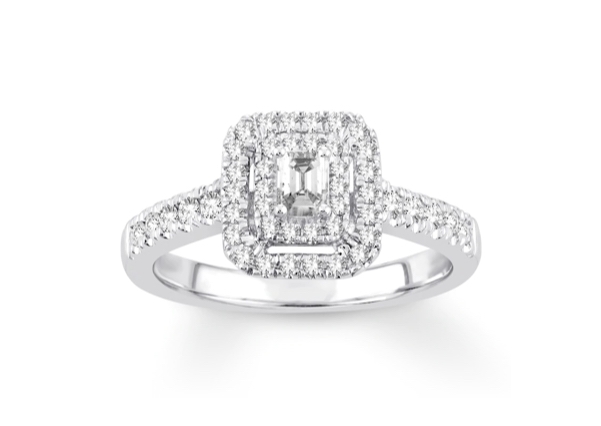 An emerald-cut diamond in a halo setting