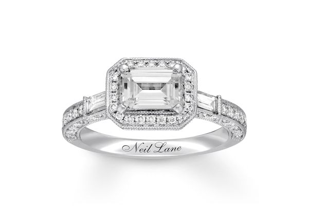 An emerald-cut engagement ring in a unique setting