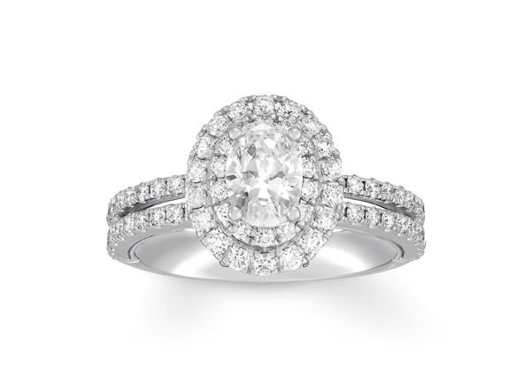 An oval-cut diamond engagement ring in a halo setting