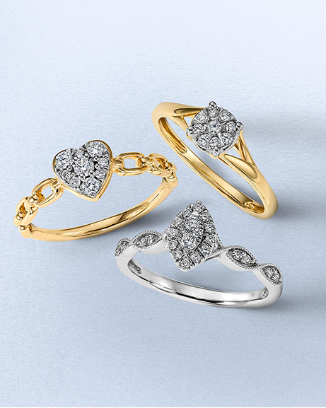 Three diamond rings on light blue background