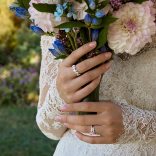 Bride holding flower bouquet