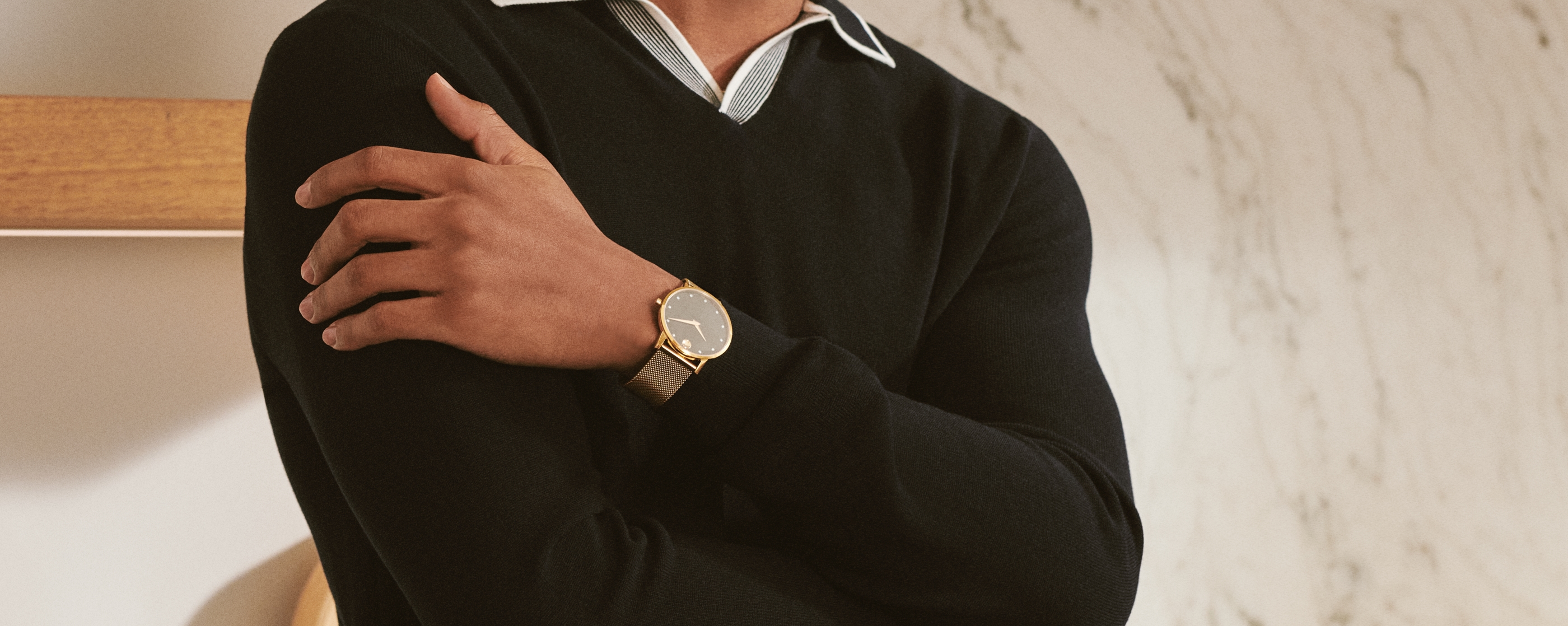 Image of man wearing Movado watch