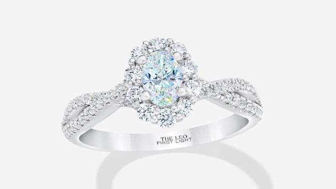 Diamond Halo engagement ring. Learn more about this trendy  ring style