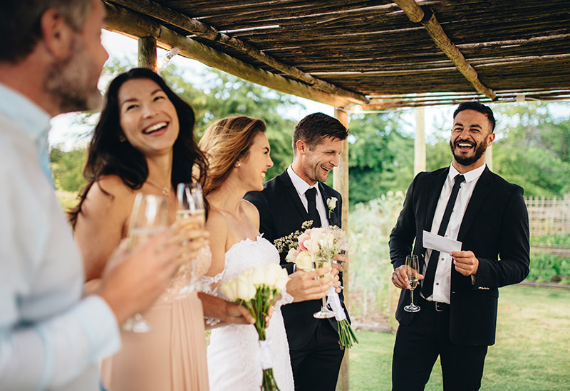 Wedding party laughing and enjoying each other's company