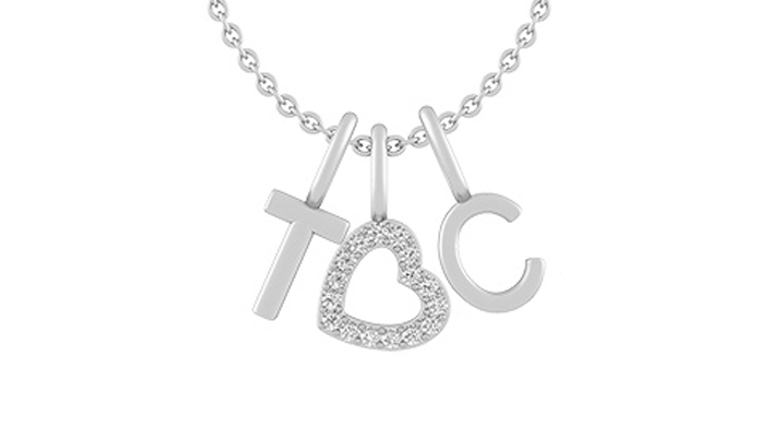 Image of silver couple necklace with heart in between initials T and C