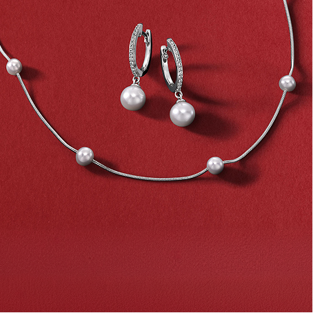 A pearl necklace with matching pearl earrings from KAY.