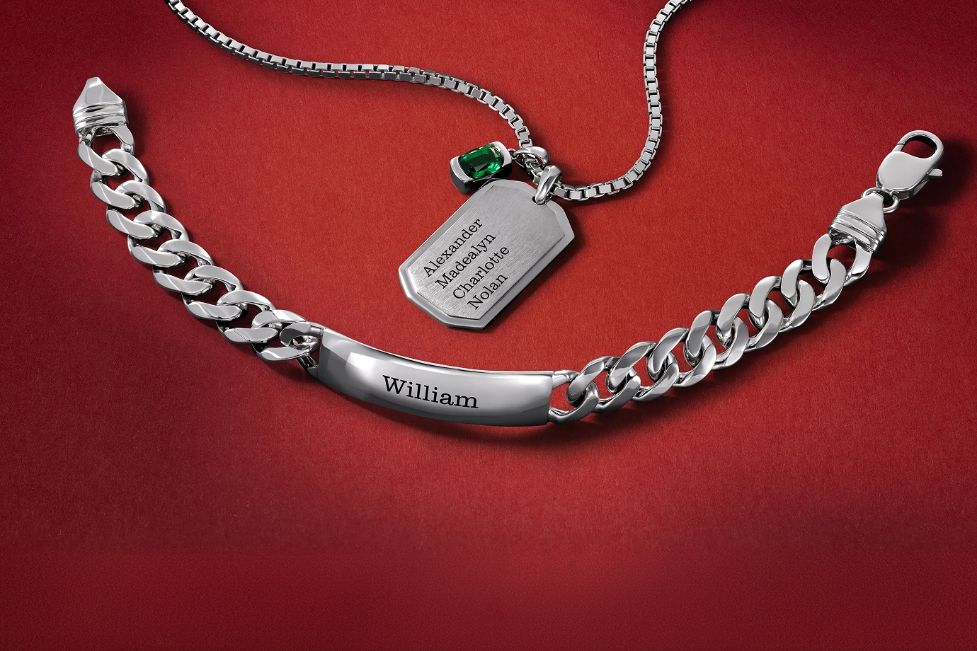 A silver dog-tag, chain necklace with engraved names, and a matching silver chain bracelet, from KAY.