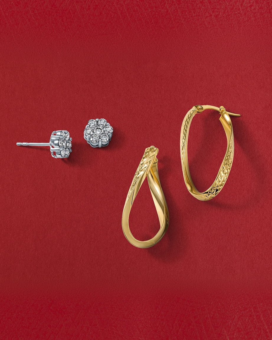 A set of diamond studs, and a set of gold hoops from KAY.