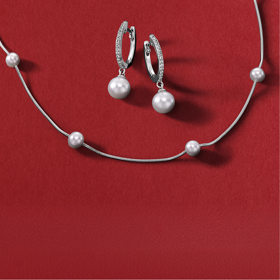 A pearl necklace with matching pearl earrings from KAY.