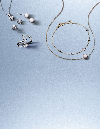 Various diamond, pearl, and gold, earrings and necklaces from KAY.