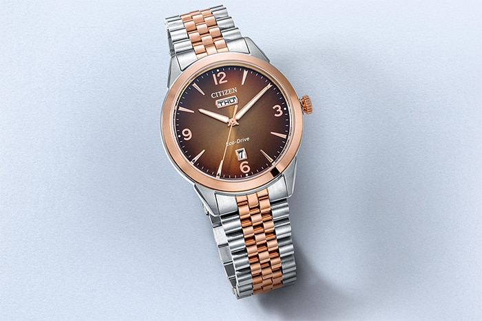 A dual-tone, rose gold and stainless steel Eco-Drive watch by Citizen, from KAY.
