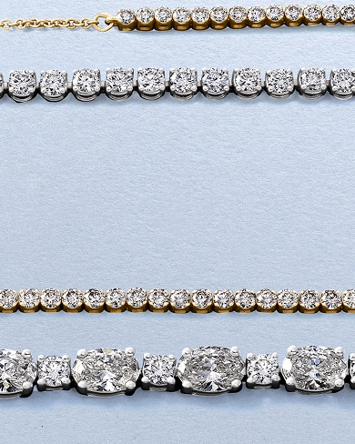 Four different diamond tennis bracelets in varying gold and silver from KAY.