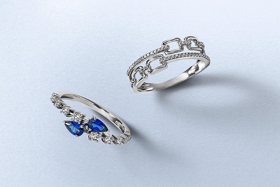 Two silver diamond rings by KAY.