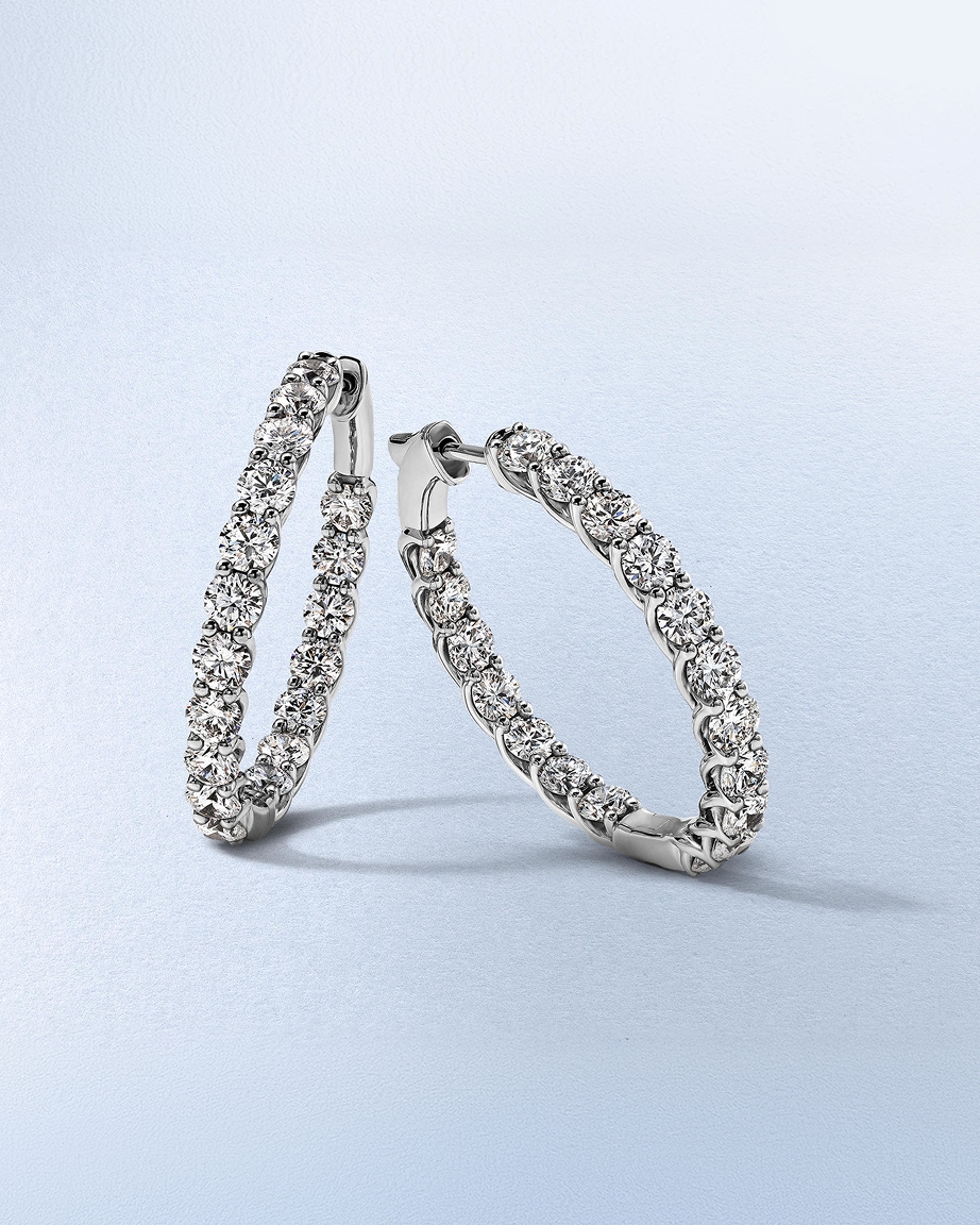 A set of diamond anniversary earrings from KAY.