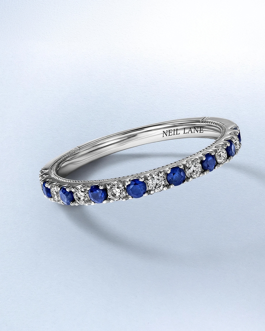 A sapphire and diamond inlaid anniversary ring from KAY.