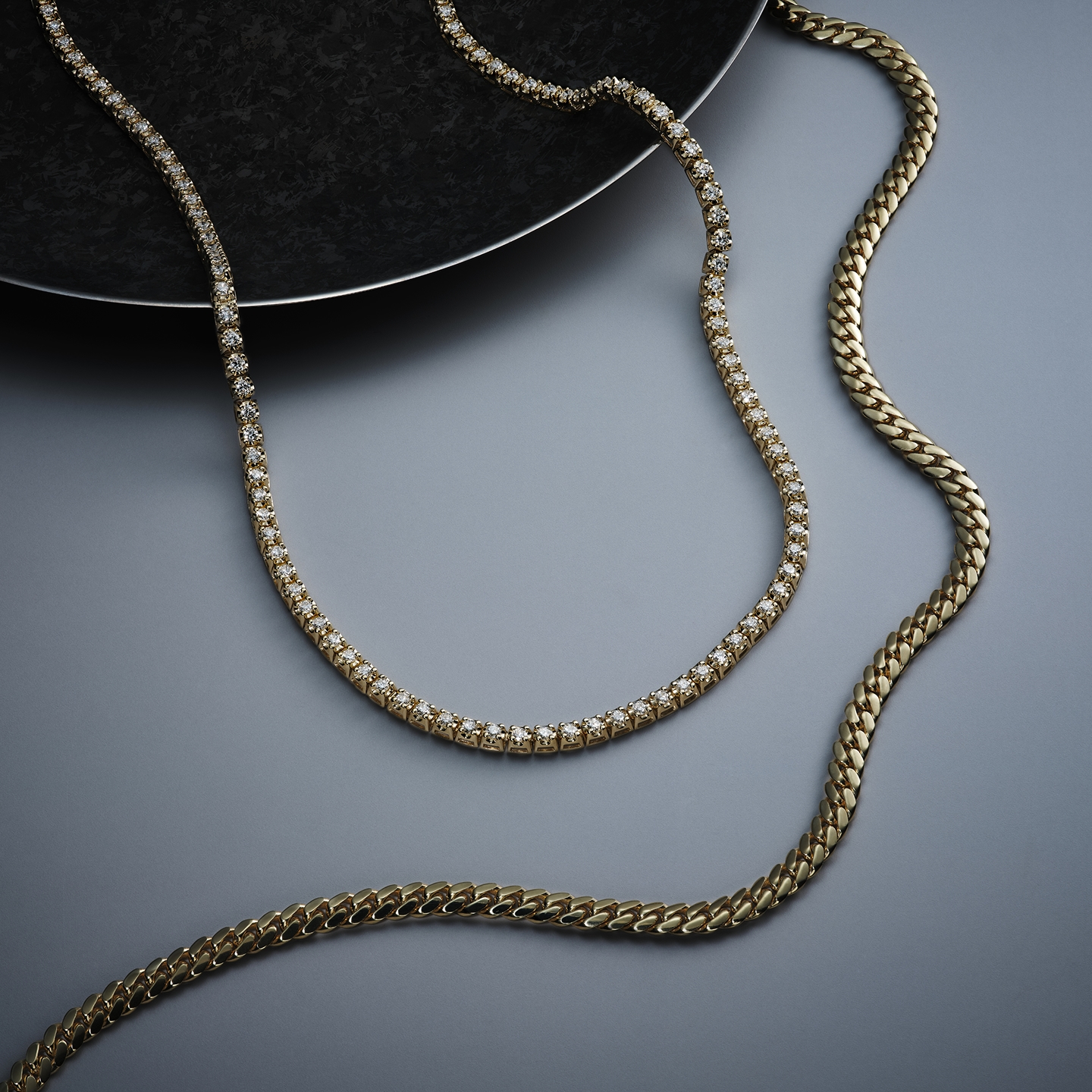 Two gold men's chains from KAY.