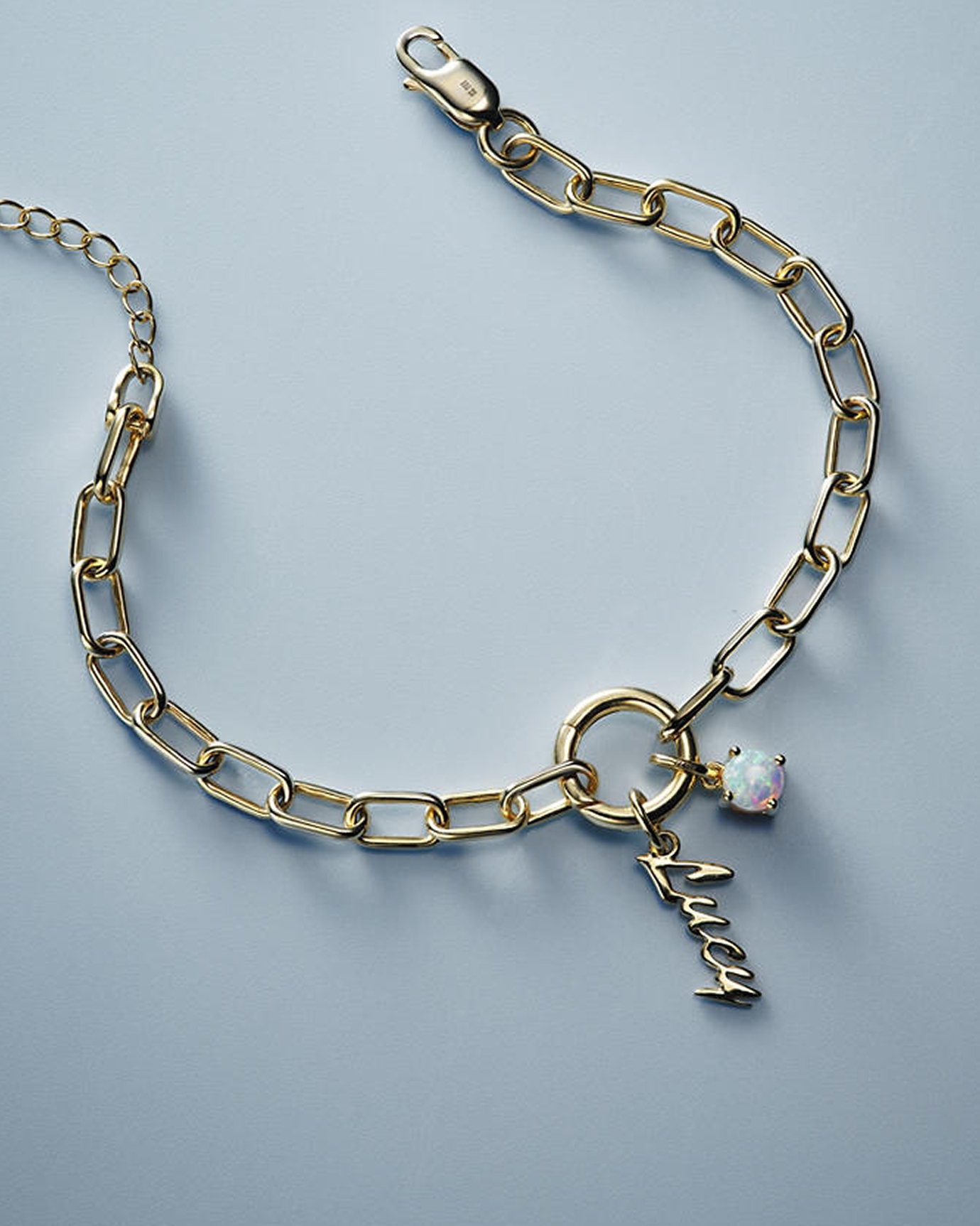 A custom, gold, chain link necklace from KAY.