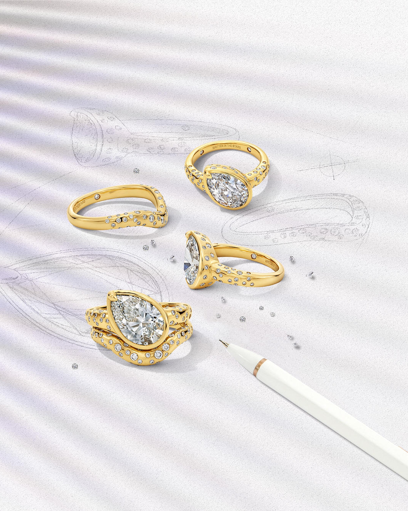 Four custom gold rings, from scratch, by KAY.