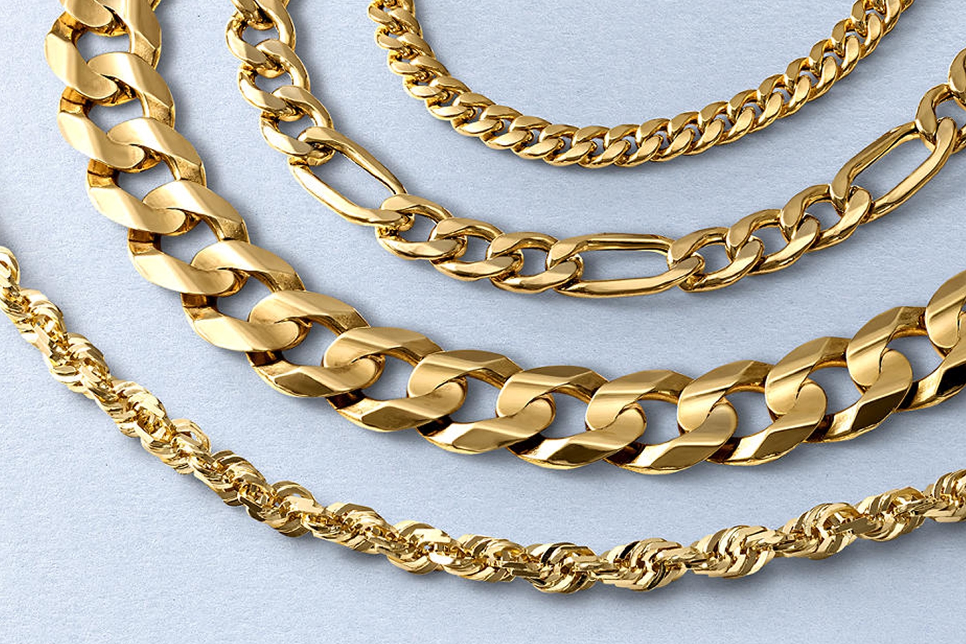 Four different types of gold chains from KAY.