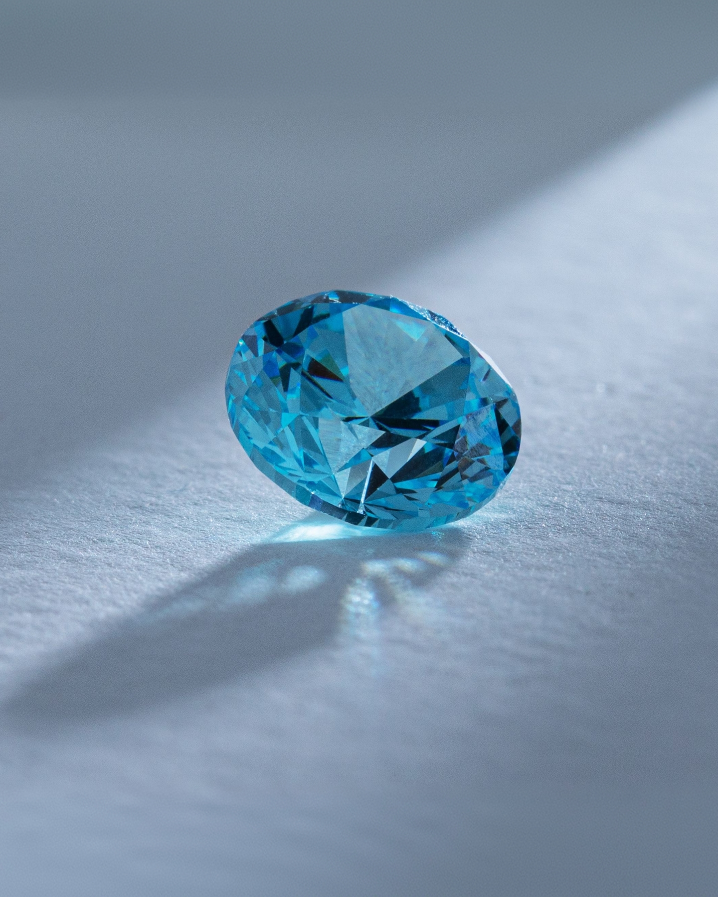A blue diamond by KAY.