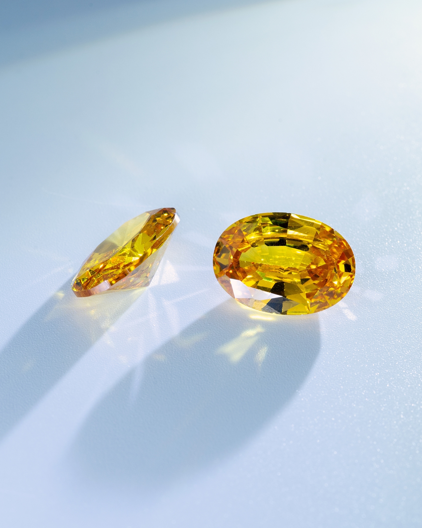 A yellow diamond by KAY.