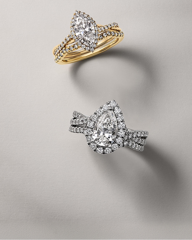 Two diamond engagement rings showcasing cut; one gold, one silver, by KAY.