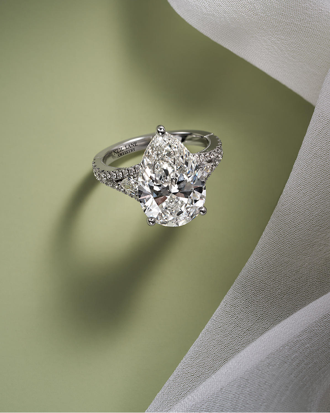 A sparkling, pear-shape, diamond engagement rings showcasing clarity, by KAY.