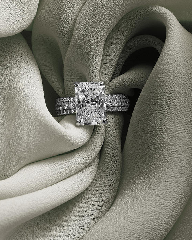 A sparkling radiant-cut, diamond engagement ring by KAY.