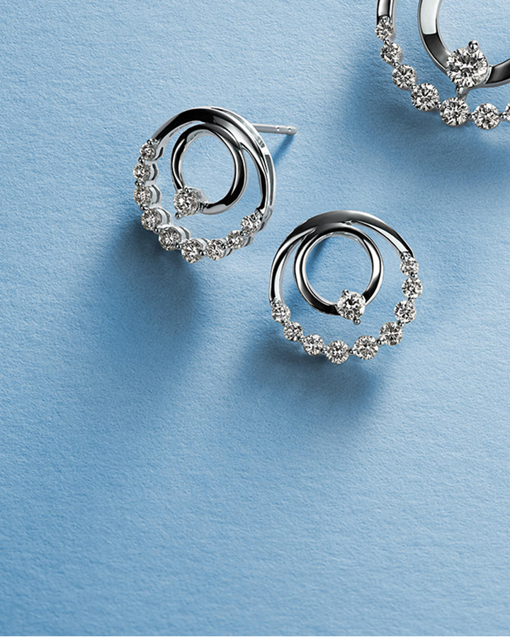 A pair of sterling silver earrings from KAY.