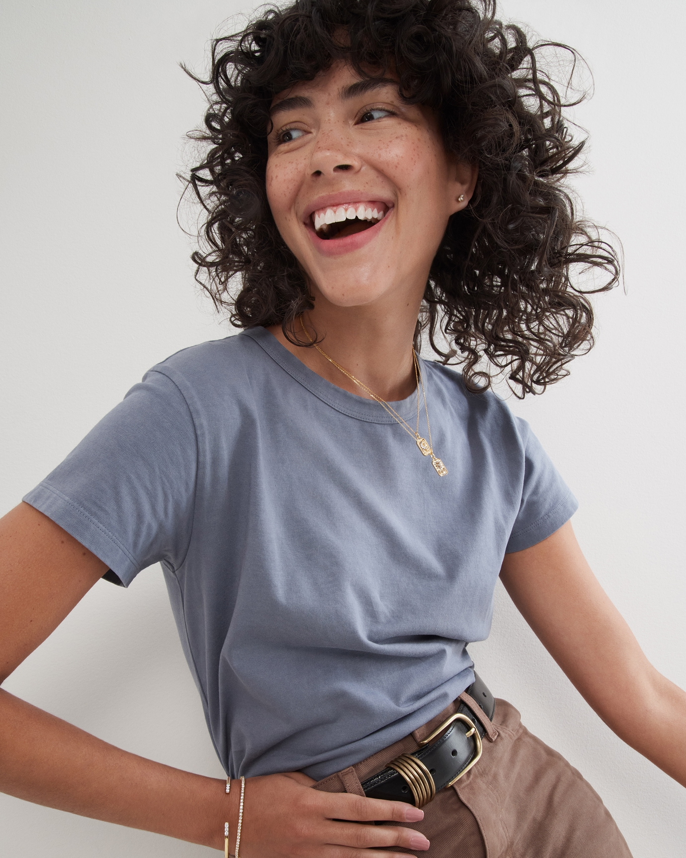 A model wearing a bracelet and necklace by Rocksbox, from KAY.