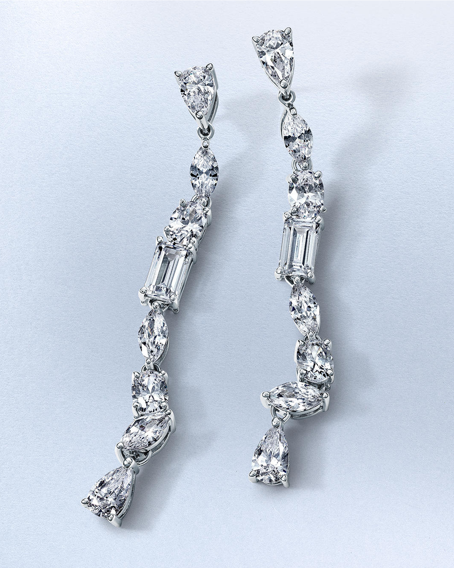 A pair of diamond drop earrings from KAY.