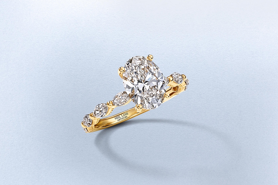 A gold band, diamond engagement ring from KAY.