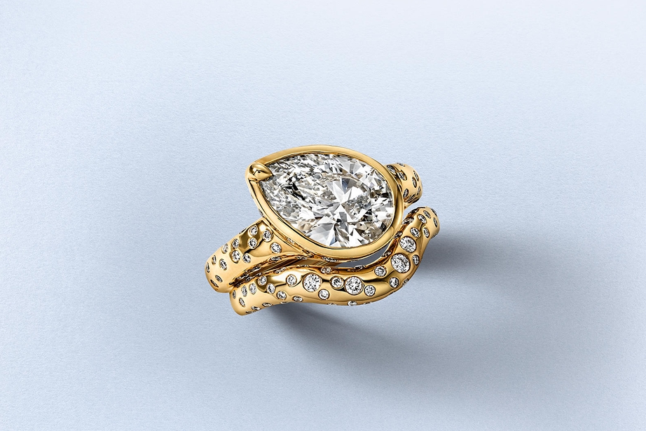 A gold double rin with a pear shape diamond from KAY.
