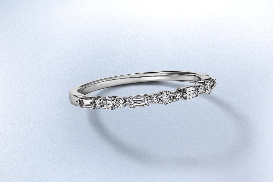 A white gold diamond inlaid ring from KAY.