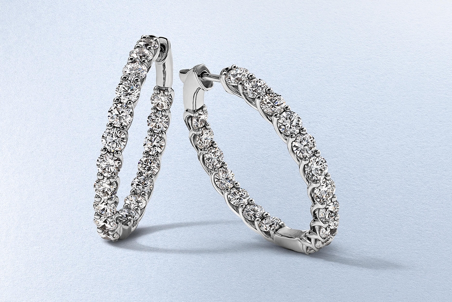 A pair of white gold diamond earrings from KAY.