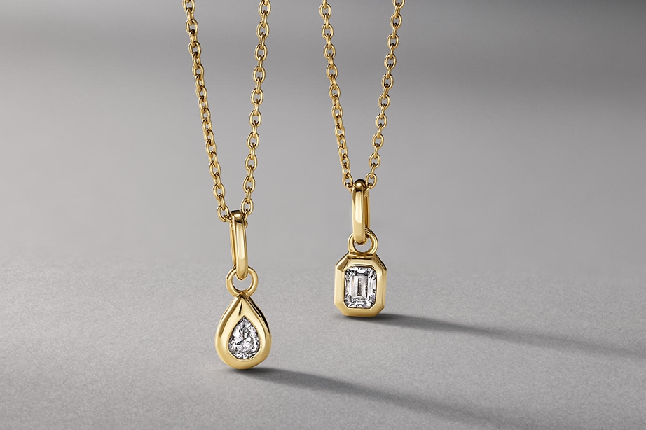 Two gold plated and vermeil, diamond pendant necklaces from KAY.