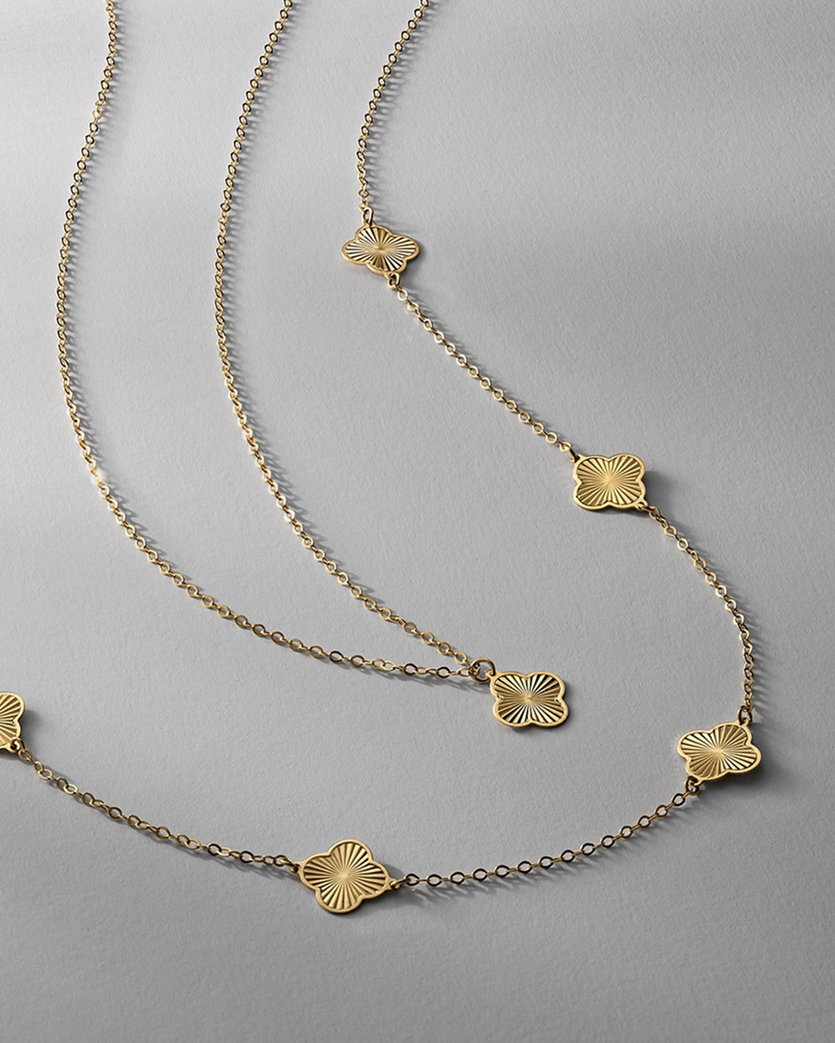 Two gold layering necklaces from KAY.