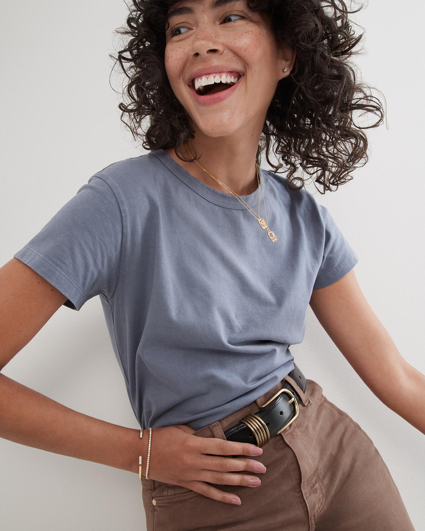 A model wearing a bracelet and necklace by Rocksbox, from KAY.