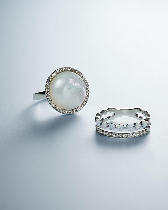 A sterling silver ring and matching earring from KAY.