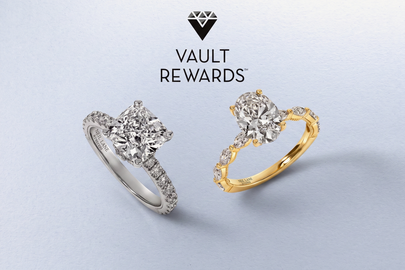 Vault Rewards logo above two diamond engagement rings