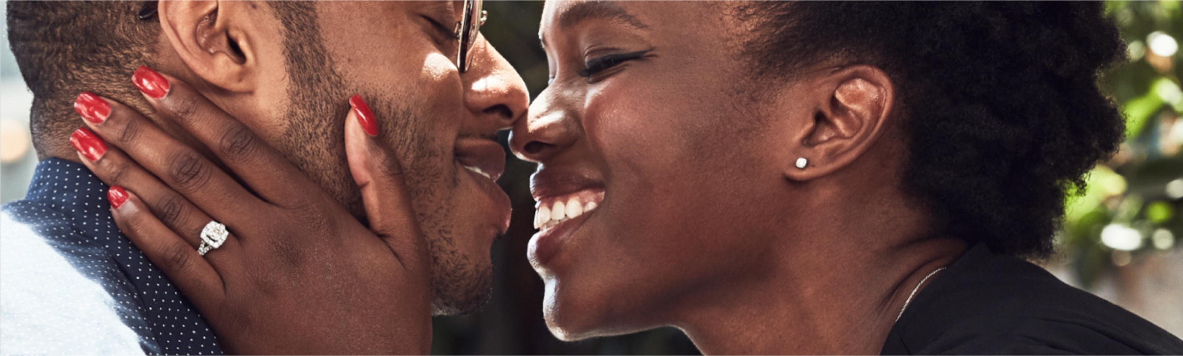 Couple smiling and embracing