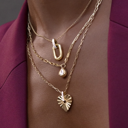 Woman wearing STUDIO BY KAY necklaces