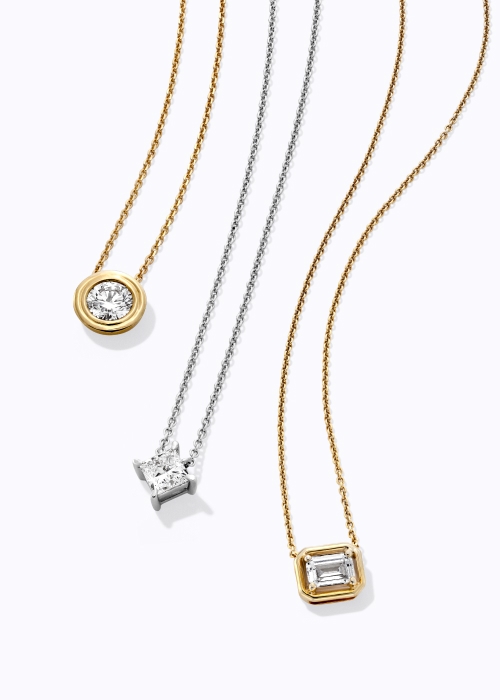 Diamond solitaire pendants