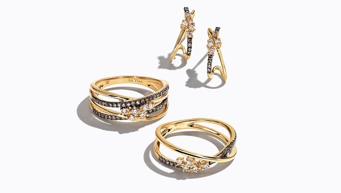 Two Le Vian rings and a pair of earrings.