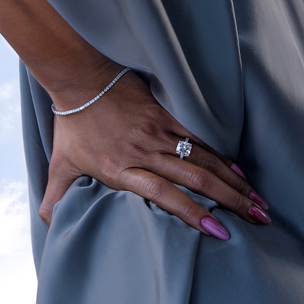A model showing off a diamond ring and bracelet from the Neil Lane Artistry collection.