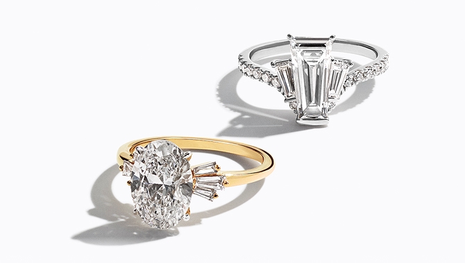 A gold band and silver band diamond engagement rings.