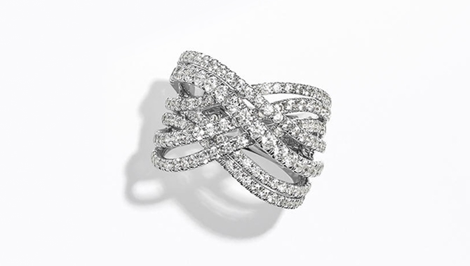 A diamond ring with a silver band.